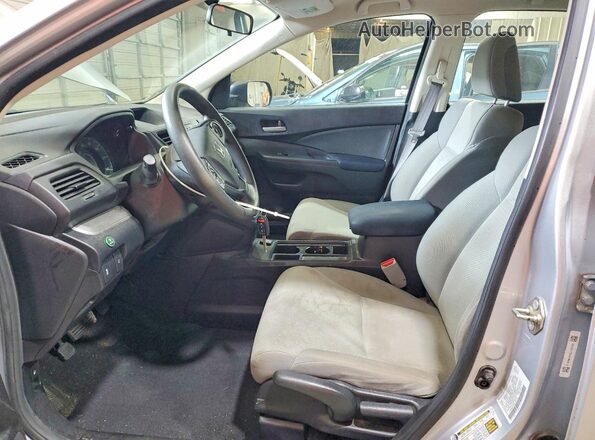 5J6RM4H39GL128709 2016 HONDA CR-V Silver Front interior view
