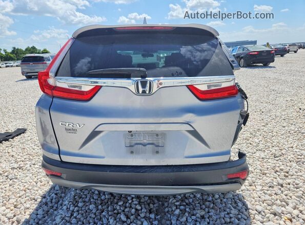 5J6RW1H56JA009268 2018 HONDA CR-V Silver Вид ззаду