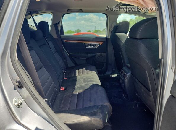 5J6RW1H56JA009268 2018 HONDA CR-V Silver Вид задньої частини салону