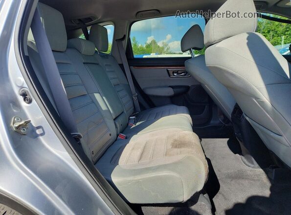 5J6RW1H58JA009305 2018 HONDA CR-V Silver Widok wnętrza z tyłu