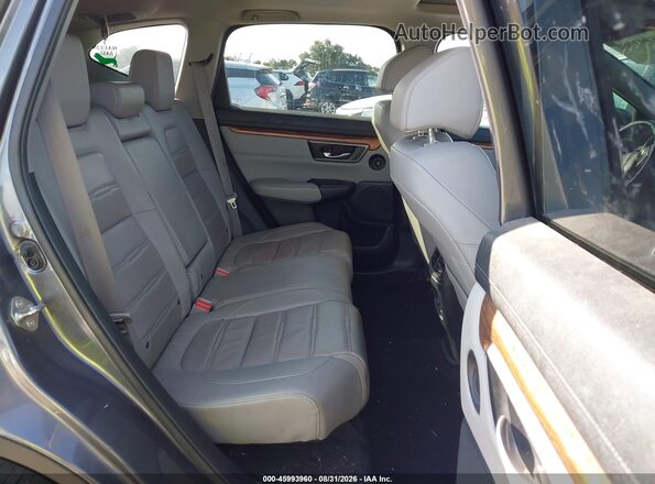 5J6RW1H86JA010141 2018 HONDA CR-V Gray Widok naklejki z numerem VIN