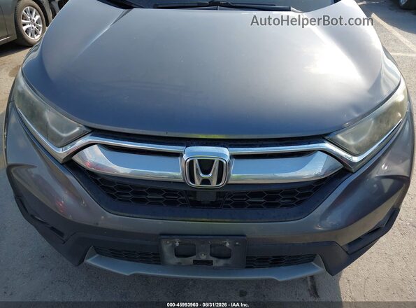 5J6RW1H86JA010141 2018 HONDA CR-V Gray Widok z przodu