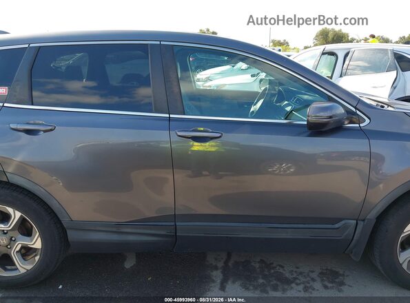 5J6RW1H86JA010141 2018 HONDA CR-V Gray Widok wnętrza z tyłu
