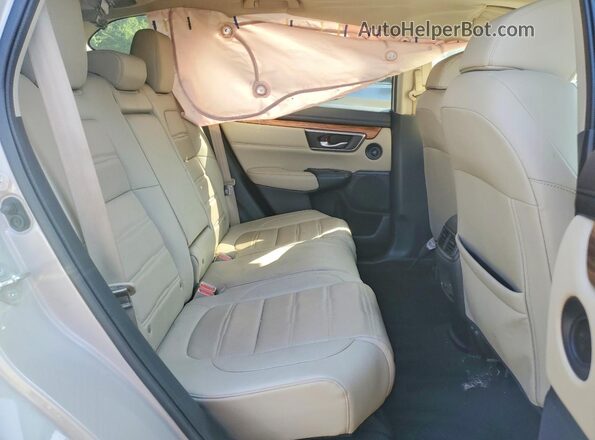 5J6RW1H89JL006573 2018 HONDA CR-V Beige Rear interior view