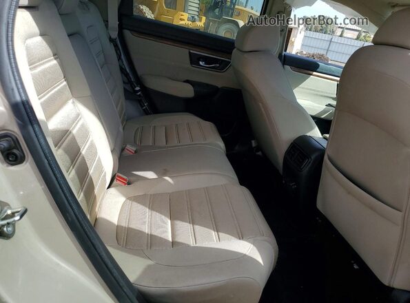 5J6RW2H51KL002935 2019 HONDA CR-V Tan Widok wnętrza z tyłu