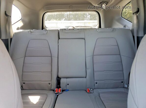 5J6RW2H86LA010956 2020 HONDA CR-V Silver Rear seats view