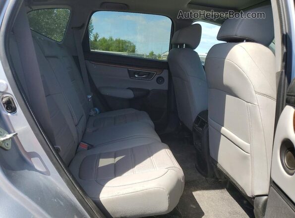5J6RW2H86LA010956 2020 HONDA CR-V Silver Rear interior view