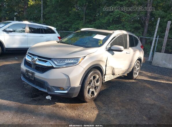 5J6RW2H99JL012016 2018 HONDA CR-V Gold Vista tres cuartos delantera izquierda