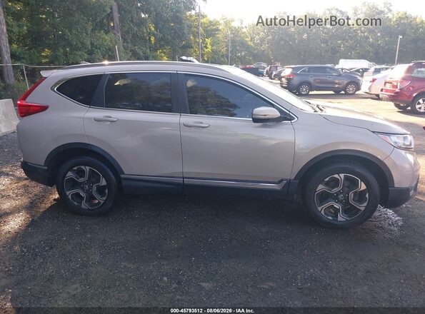 5J6RW2H99JL012016 2018 HONDA CR-V Gold Vista interior trasera