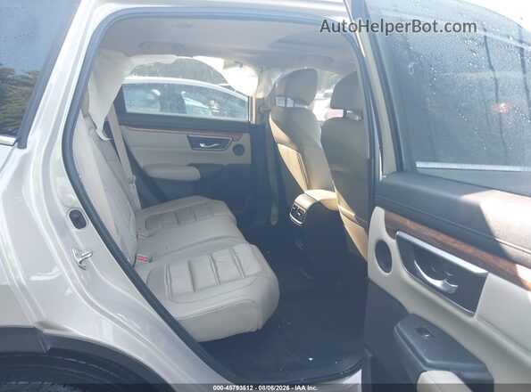 5J6RW2H99JL012016 2018 HONDA CR-V Gold Vista de la etiqueta del VIN