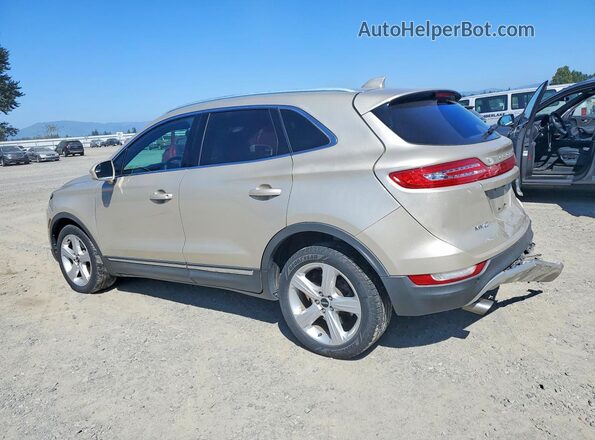 5LMCJ1C90HUL31510 2017 LINCOLN MKC Gold Rear left