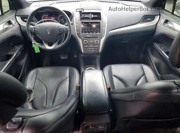 5LMCJ1C97GUJ00859 2016 LINCOLN MKC Серебряный Вид панели приборов
