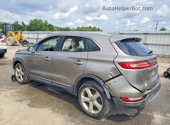 5LMCJ1C98HUL68529 2017 LINCOLN MKC Brown Rear left
