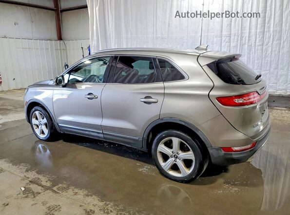 5LMCJ1D90HUL40268 2017 LINCOLN MKC Gold Trasero izquierdo