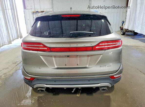 5LMCJ1D90HUL40268 2017 LINCOLN MKC Gold Vista trasera