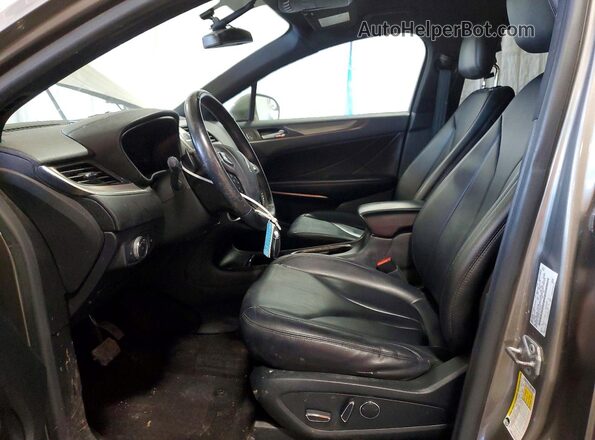 5LMCJ1D90HUL40268 2017 LINCOLN MKC Gold Vista interior delantera