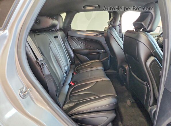 5LMCJ1D91JUL01016 2018 LINCOLN MKC Серебряный Вид задней части салона