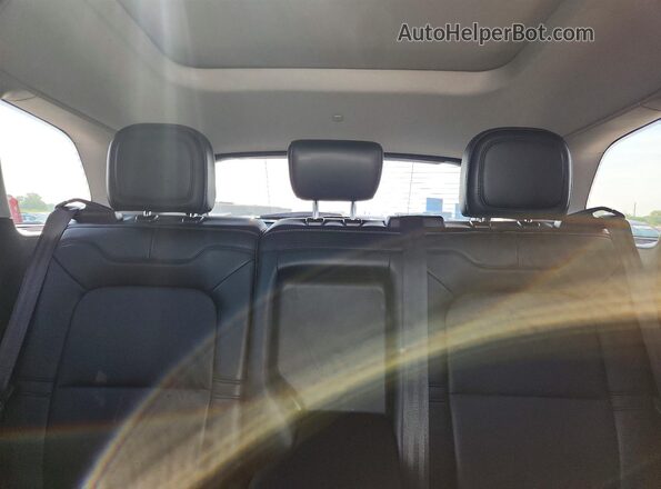 5LMCJ1D91LUL17008 2020 LINCOLN CORSAIR Beige Vista de los asientos traseros
