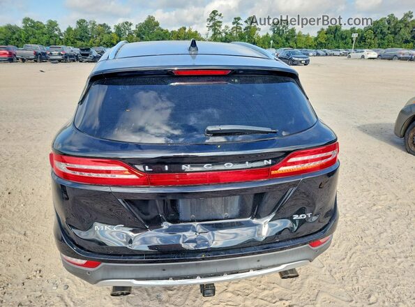 5LMCJ2C90HUL12719 2017 LINCOLN MKC Черный Вид задней части салона