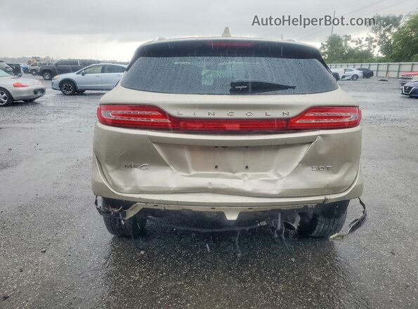 5LMCJ2C98HUL13715 2017 LINCOLN MKC Beige Vista trasera