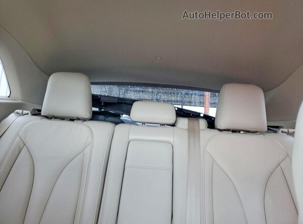 5LMCJ2C98HUL13715 2017 LINCOLN MKC Beige Vista de los asientos traseros