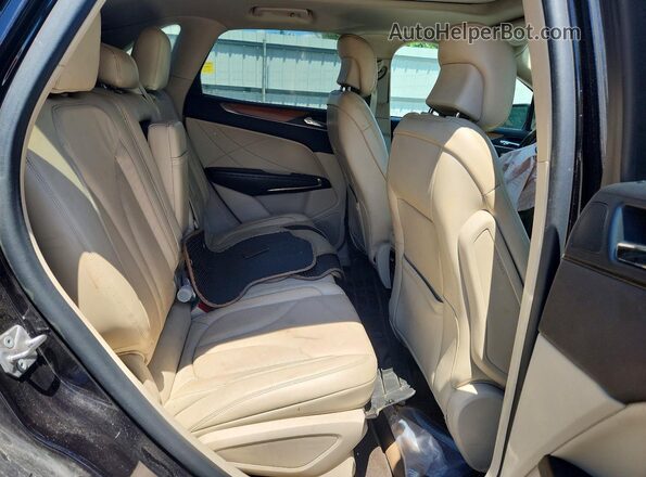 5LMCJ2D93KUL01820 2019 LINCOLN MKC Black Vista interior trasera