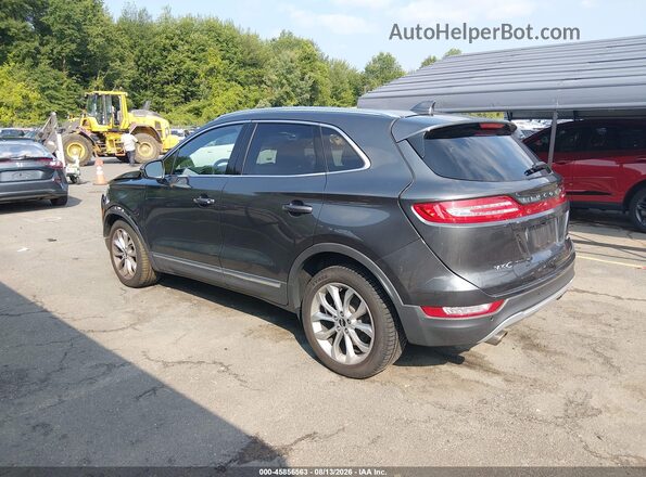 5LMCJ2D94HUL15203 2017 LINCOLN MKC Gray Trasero izquierdo