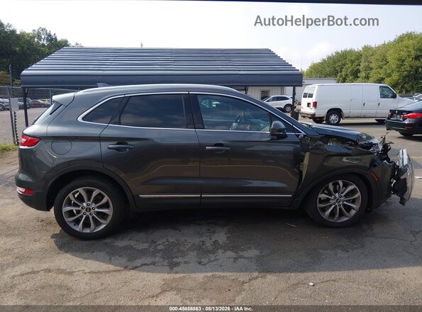 5LMCJ2D94HUL15203 2017 LINCOLN MKC Gray Vista interior trasera