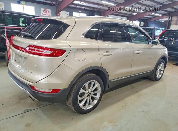 5LMCJ2D95HUL62174 2017 LINCOLN MKC Tan Tył prawy