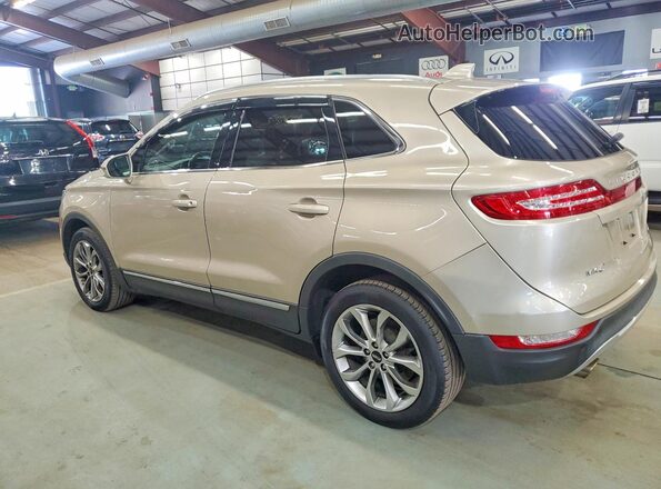 5LMCJ2D95HUL62174 2017 LINCOLN MKC Tan Tył lewy