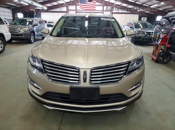 5LMCJ2D95HUL62174 2017 LINCOLN MKC Tan Widok z przodu