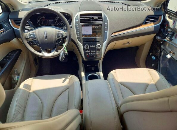5LMCJ2D97KUL53211 2019 LINCOLN MKC Tan Vista del salpicadero