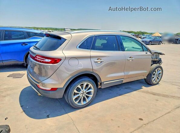 5LMCJ2D97KUL53211 2019 LINCOLN MKC Tan Trasero derecho