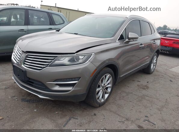 5LMCJ2D98GUJ31221 2016 LINCOLN MKC Коричневый Передняя левая четверть