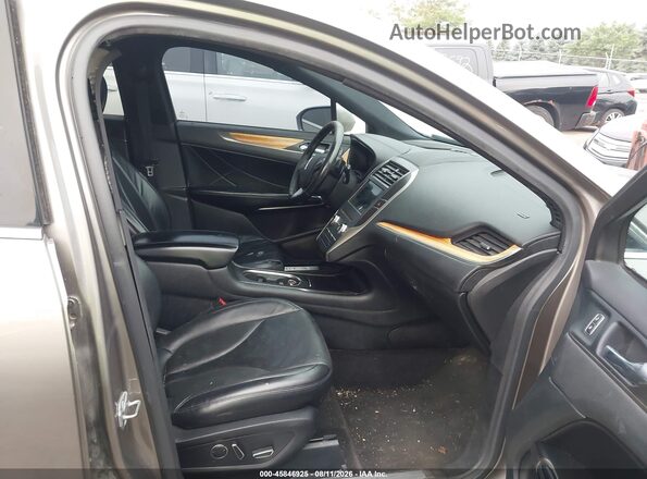5LMCJ2D98GUJ31221 2016 LINCOLN MKC Коричневый Вид салона спереди