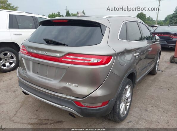 5LMCJ2D98GUJ31221 2016 LINCOLN MKC Коричневый Задняя правая четверть