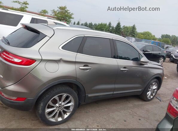 5LMCJ2D98GUJ31221 2016 LINCOLN MKC Коричневый Вид задней части салона