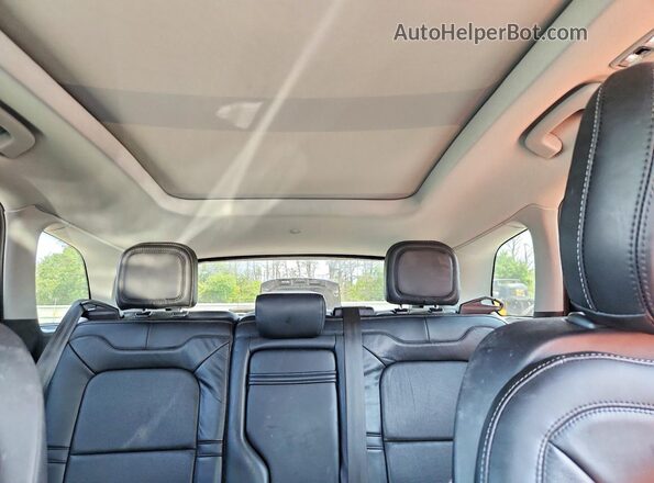 5LMCJ2D98LUL00938 2020 LINCOLN CORSAIR Burgundy Rear seats view