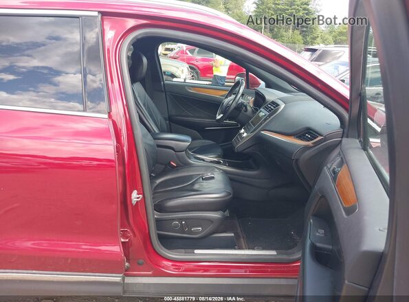 5LMCJ2D99HUL56619 2017 LINCOLN MKC Red Vista interior delantera