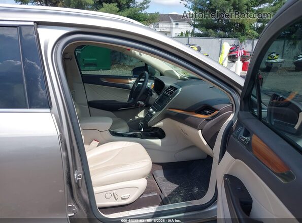 5LMCJ2D9XHUL34192 2017 LINCOLN MKC Желто-коричневый Вид салона спереди