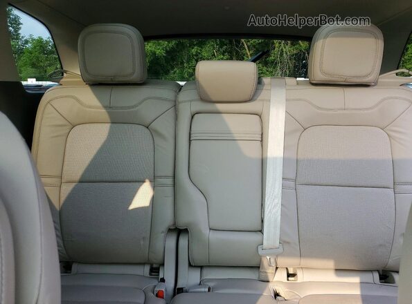 5LMCJ2DH8LUL21859 2020 LINCOLN CORSAIR White Rear seats view