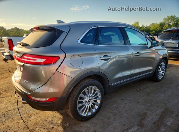 5LMCJ3C96HUL13797 2017 LINCOLN MKC Silver Tył prawy