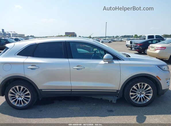 5LMCJ3D92GUJ15456 2016 LINCOLN MKC Серебряный Вид задней части салона