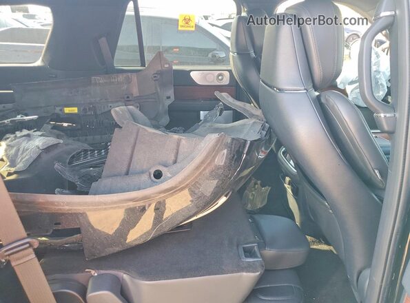 5LMJJ2LG7PEL16197 2023 LINCOLN NAVIGATOR Black Vista interior trasera