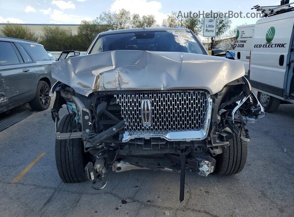 5LMJJ2LT3KEL10239 2019 LINCOLN NAVIGATOR Коричневый Вид спереди