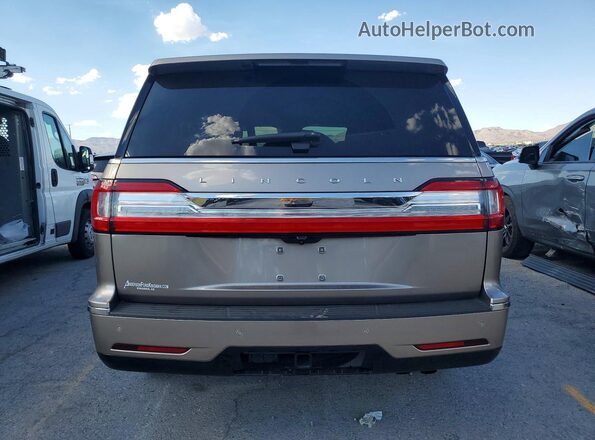 5LMJJ2LT3KEL10239 2019 LINCOLN NAVIGATOR Коричневый Вид сзади