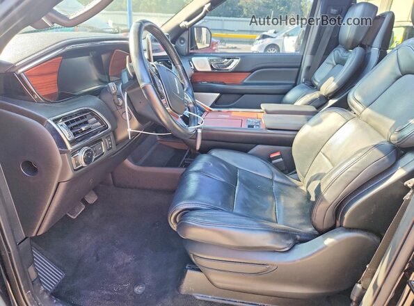 5LMJJ2LTXMEL11973 2021 LINCOLN NAVIGATOR Black Front interior view