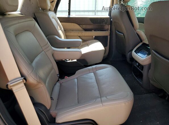 5LMJJ2NG7REL15941 2024 LINCOLN NAVIGATOR Tan Rear seats view