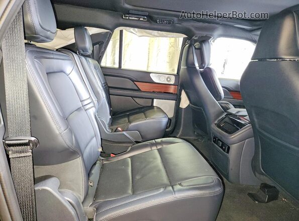 5LMJJ3LG2REL16584 2024 LINCOLN NAVIGATOR Black Widok wnętrza z tyłu