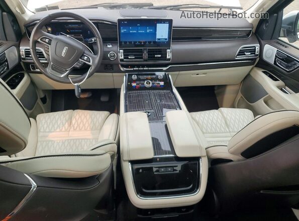5LMJJ3TG0PEL03104 2023 LINCOLN NAVIGATOR Белый Вид панели приборов